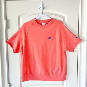 Champion Reverse Weave Crew Sweatshirt in bright orange